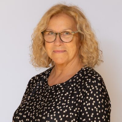 A photo of Councillor Alice Samuel, Mayor of Crewkerne wearing a black and white top