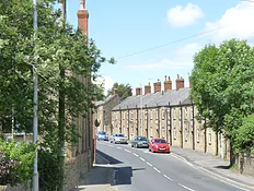 road showing traditional 19th Century terraced housing