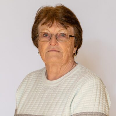 a photo of Councillor Kathy Head wearing a white and grey striped jumper