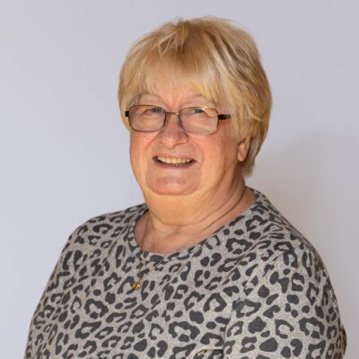 A photo of Councillor Christine Rawe in a grey leopard print top